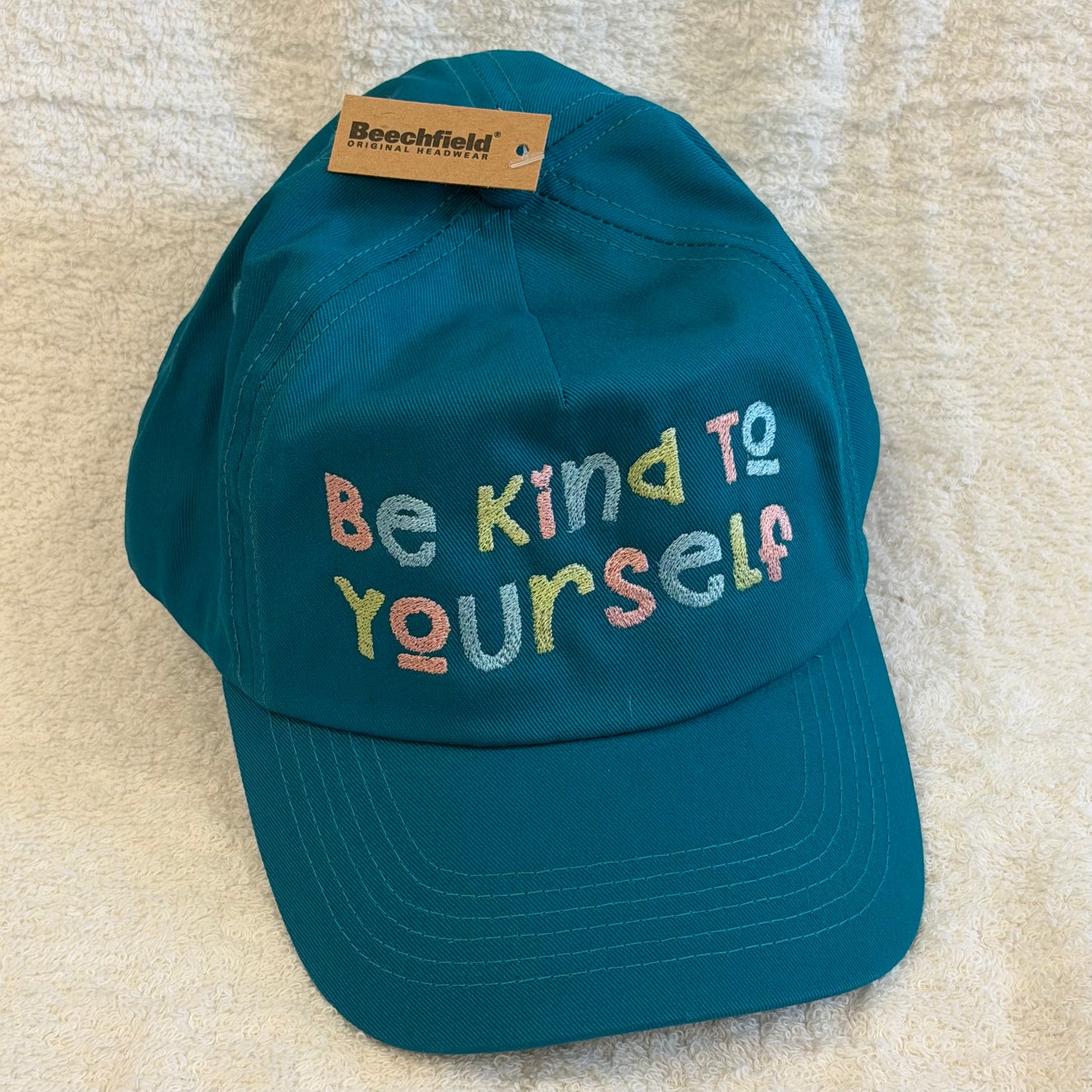 Cap petrol "be kind to yourself"